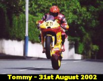 Tommy pops a wheelie at Ago's Leap. MGP 2002  Senior Race