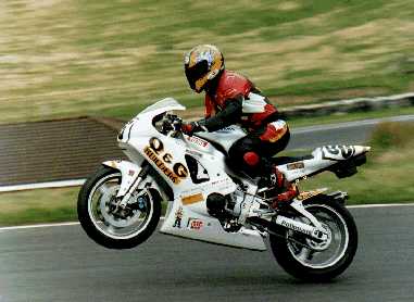 Tommy pops a wheelie at The Mountain, Cadwell Park